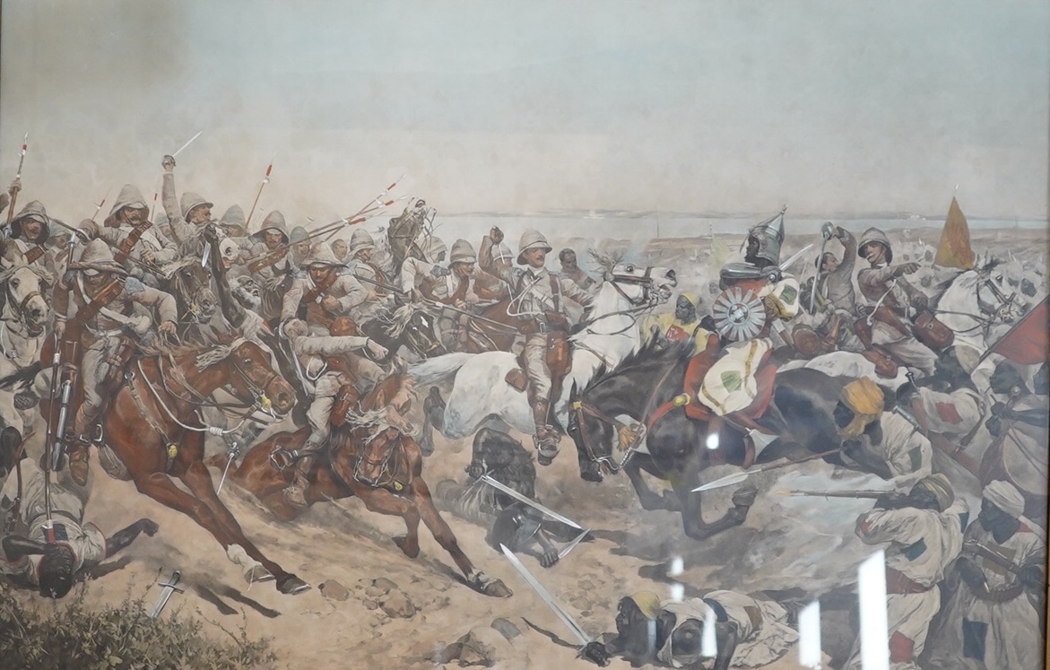 After Edward Matthew Hale (1852-1924), overpainted colour print, The charge of the 21st Lancers in September 1898, heavy gilt frame, 53x80cm. Condition - some damage/loss to frame